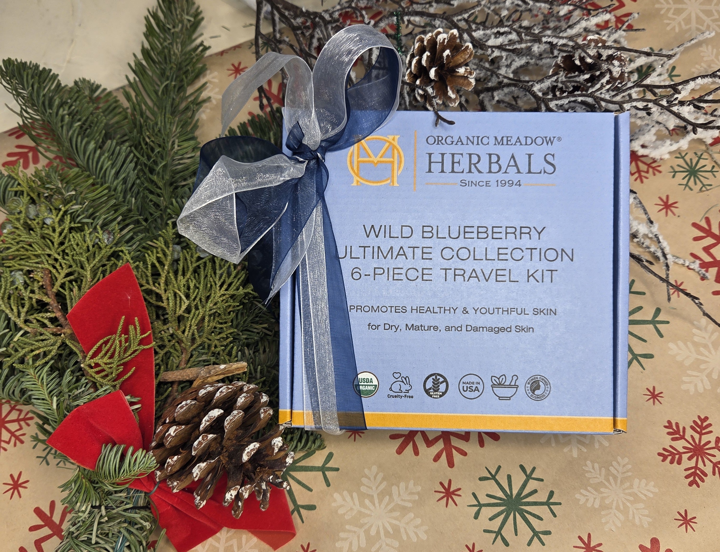 Image of a gift with flowers and a card