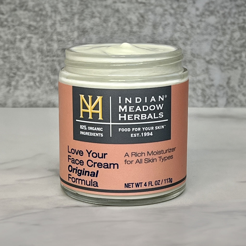 Open jar of Love your face cream original formula
