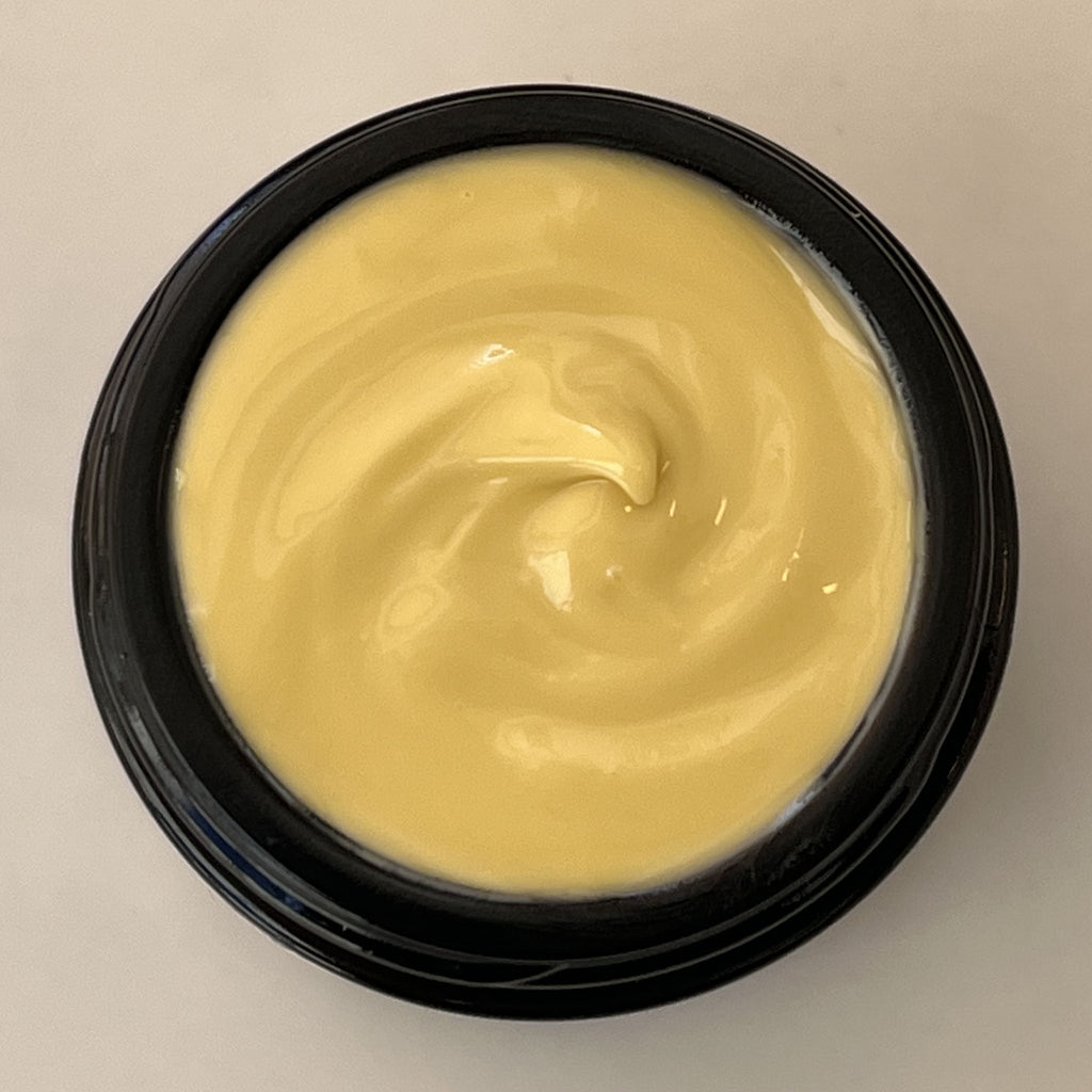 Top view of open jar of Wild Blueberry Eye Cream