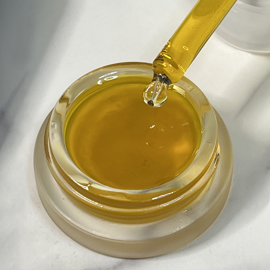 Top view of Wild Blueberry Face Oil with dropper